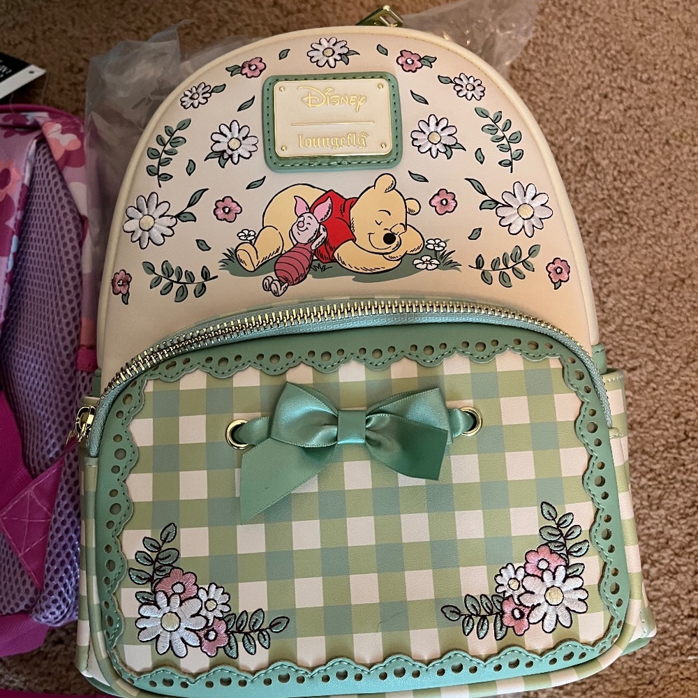Beautiful Winnie the Pooh loungefly backpack